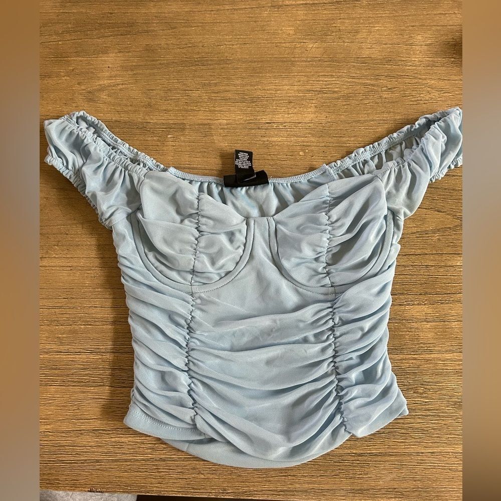 Light blue fitted ruched crop top